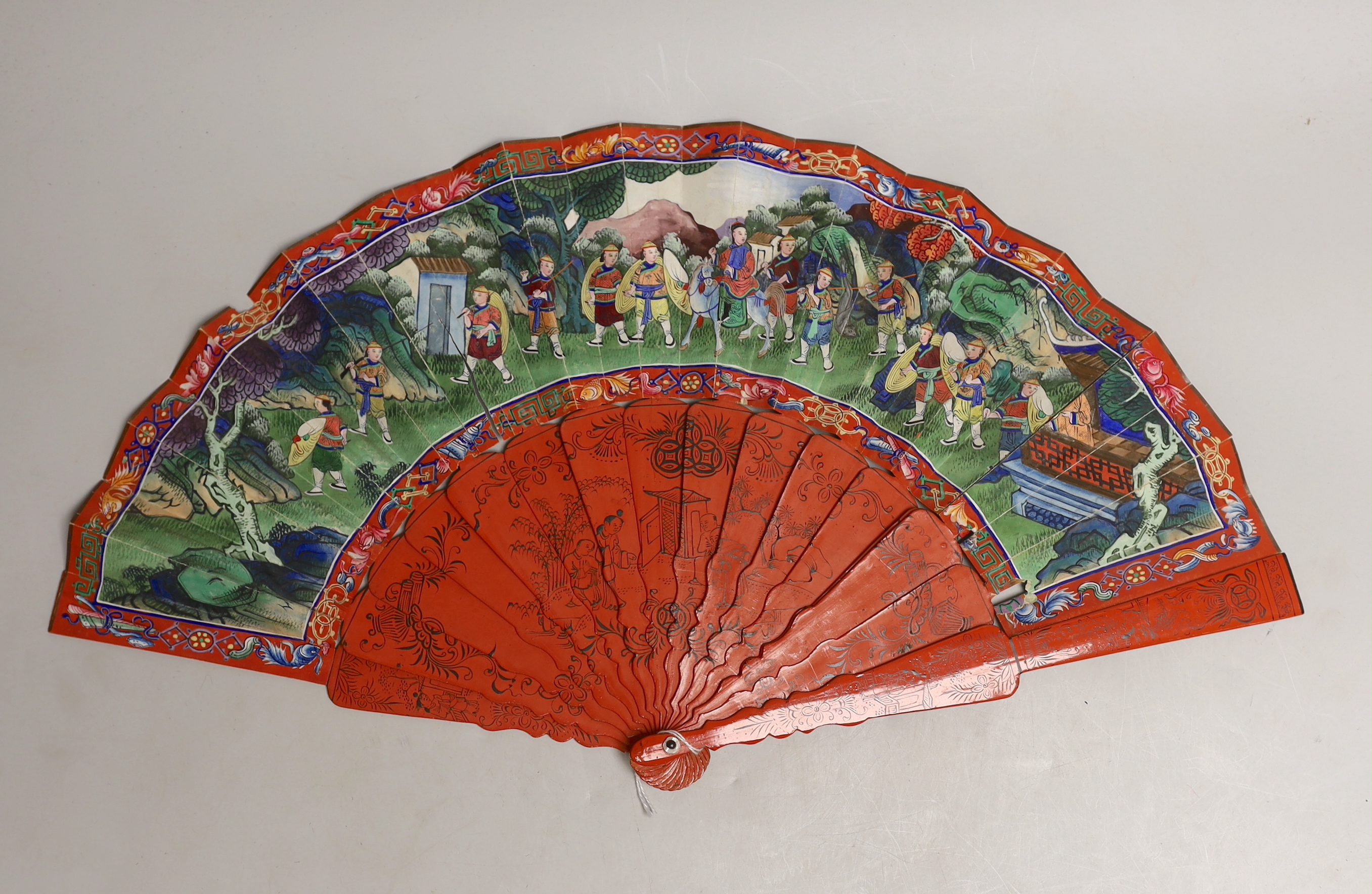 A Chinese hand painted figural fan with applied ivory faces and red lacquered guards, and boxed both damaged CITES Submission reference ERW33PQG